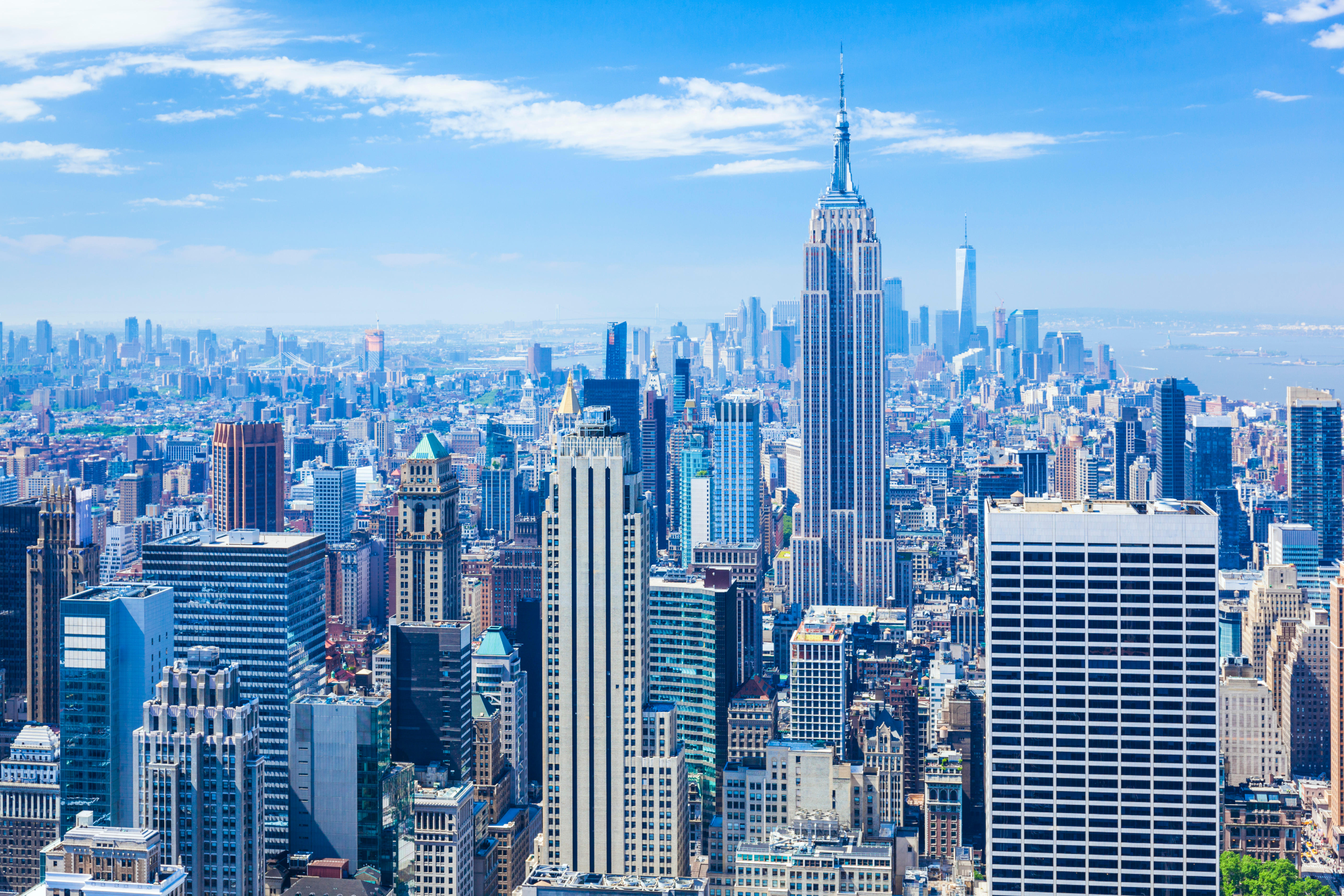 Aerial view of the Manhattan skyline, including the Empire State Building.