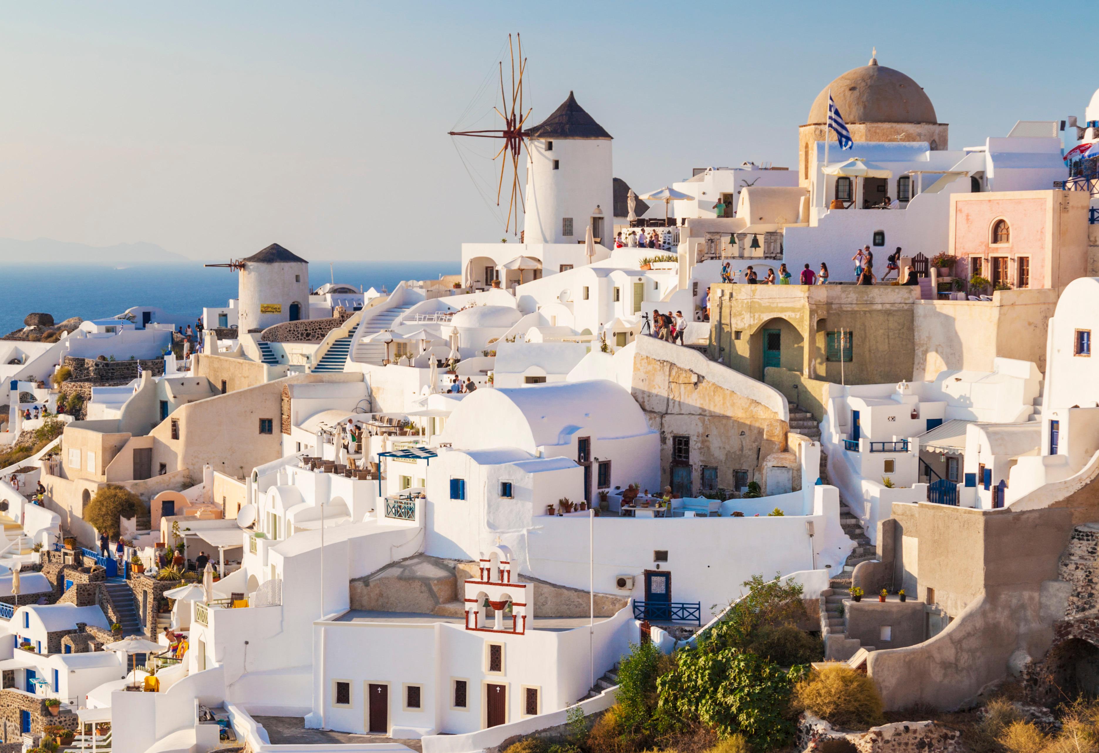 Oia, Santorini: windmill and whitewashed houses.