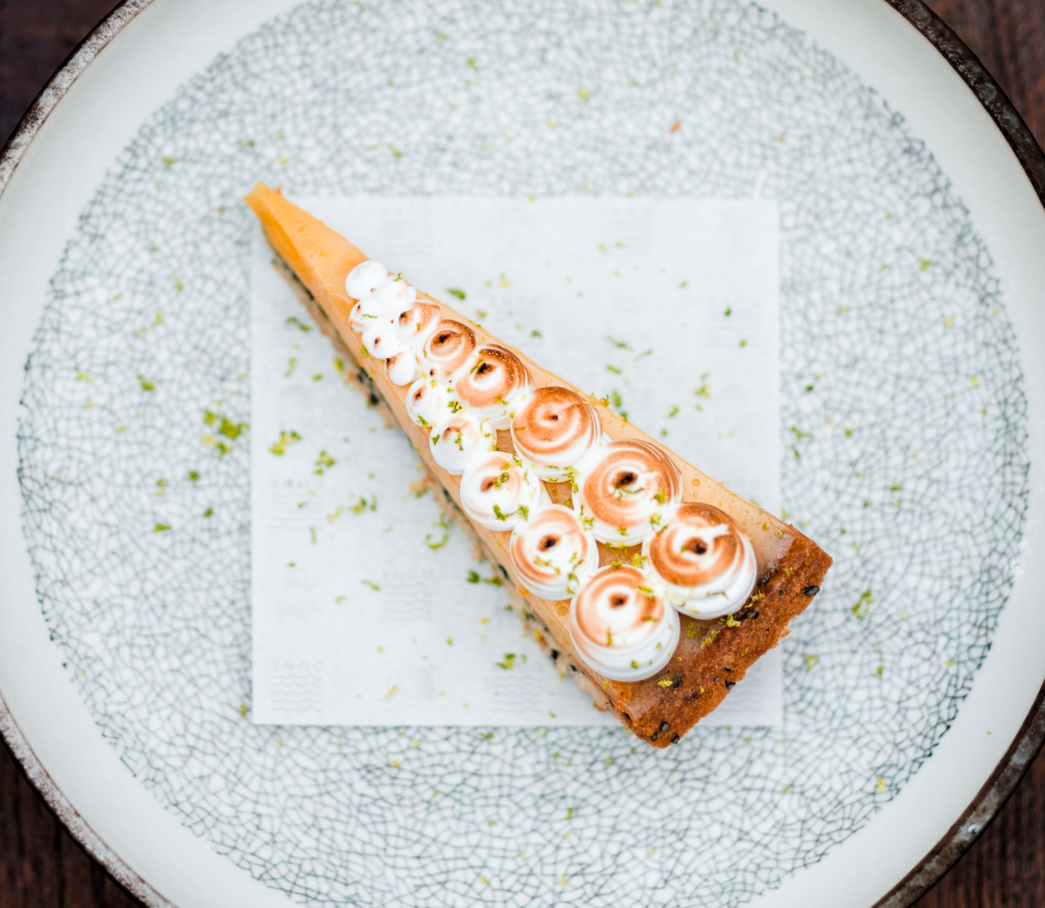 Slice of limoncello cake on a plate.