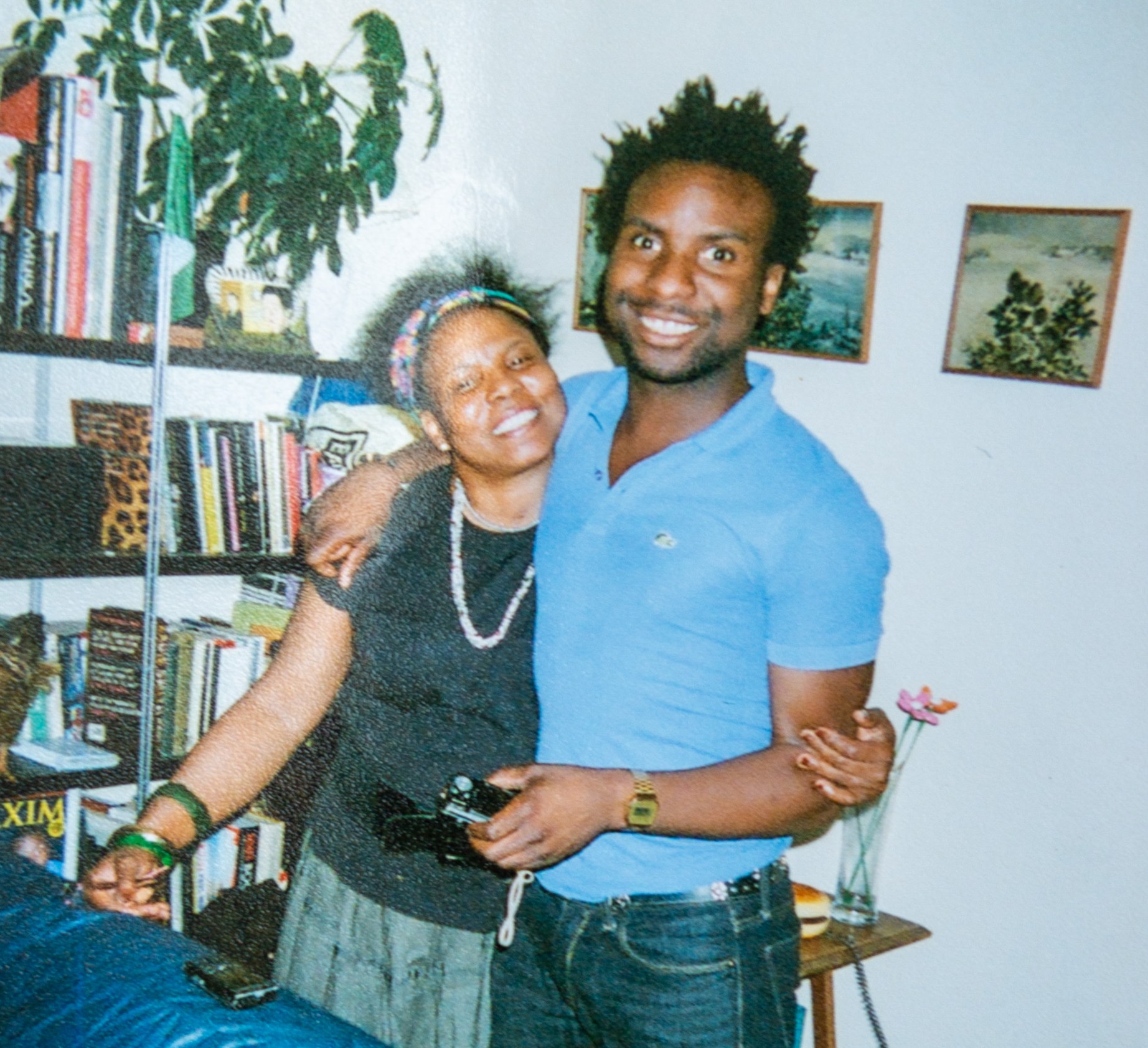 Photo of a son embracing his mother.